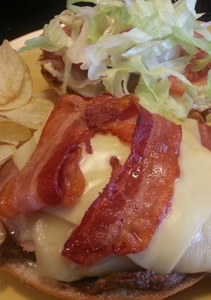 A picture of Chivito Canadiense (Uruguayan steak sandwich- Canadian style).