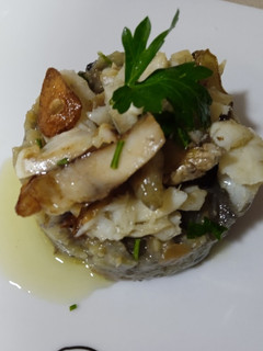 Una foto de Montadito de pescado al horno al ajillo