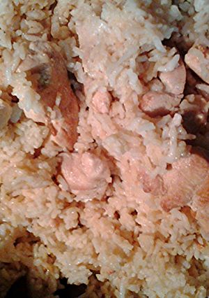 A picture of Kaffir Lime leaves in rice with chicken.