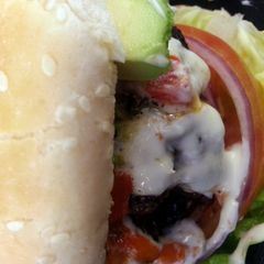A picture of Big Mouth 1/2 lb Applewood Burgers.