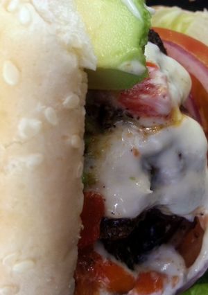 A picture of Big Mouth 1/2 lb Applewood Burgers.