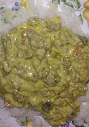 A picture of Creamy Italian sausage over rice.