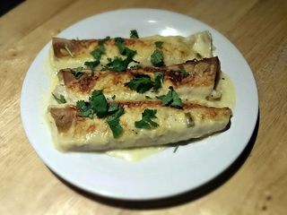 White Chicken Enchiladas with Green Chile Sour Cream Sauce