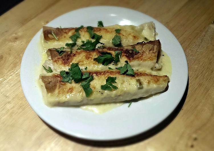 White Chicken Enchiladas with Green Chile Sour Cream Sauce