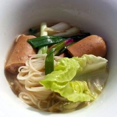 A picture of Somen Noodle Soup With Sausages.
