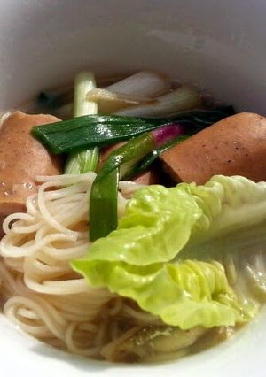 A picture of Somen Noodle Soup With Sausages.