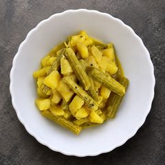 A picture of Drumstick Potato Poppy Seeds Curry (Bengali style Danta-Aloo Posto).