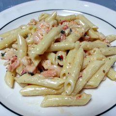 A picture of Penne with shrimps & salmon.
