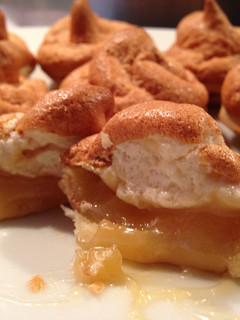 A picture of Miniature Lemon Meringue Tarts.