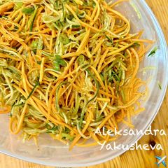 A picture of Spicy carrot and cucumber salad.