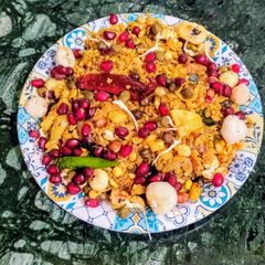 A picture of Red Poha, Sprouts, Makhana Masala.