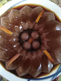 Una foto de Flan de chocolate negro y naranja!