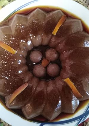 Una foto de Flan de chocolate negro y naranja!