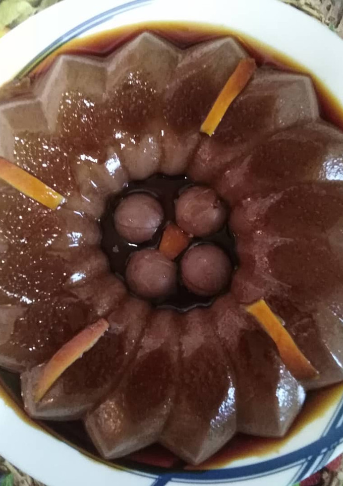 Una foto de Flan de chocolate negro y naranja!