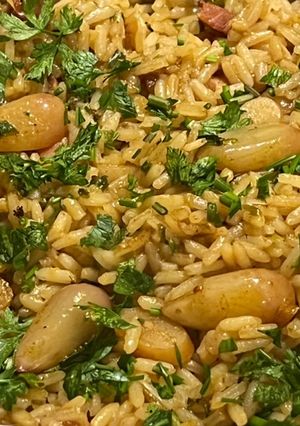 Una foto de Arroz con piñones (de pino)