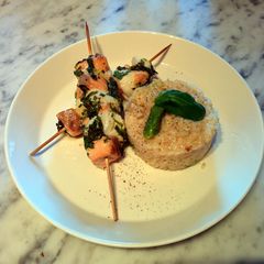 A picture of Riceotto with grilled lime fishsticks.