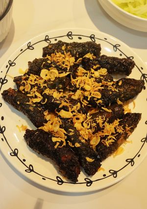 A picture of Beef Wrapped in Betel Leaves.