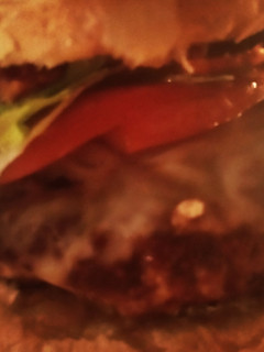 A picture of Chicken-Fried Jalapenos and Bacon Onion Burger with Spicy Mayonnaise.