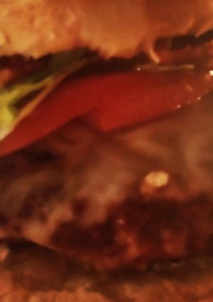 A picture of Chicken-Fried Jalapenos and Bacon Onion Burger with Spicy Mayonnaise.