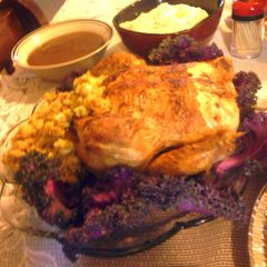 A picture of Roast Chicken with stuffing.