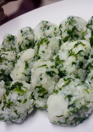 A picture of Udo Leaf Rice Balls.