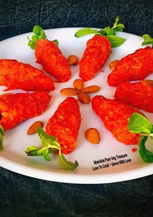 A picture of Gajar Halwa In Gajar Shape - Fancy Style Desi Dessert On the 1st Day of New Year 2026 Party.