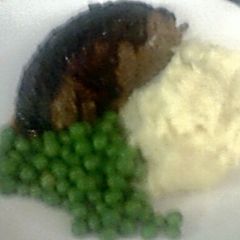 A picture of Meatloaf with BBQ sauce.