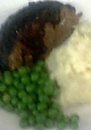 A picture of Meatloaf with BBQ sauce.