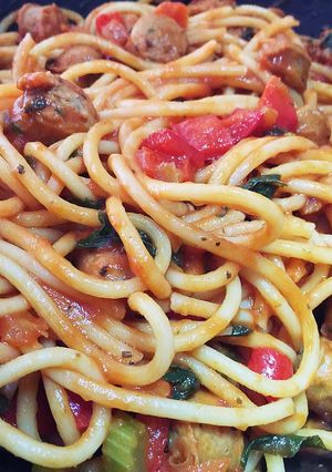 A picture of Sicily Lean Sausage Spaghetti With Freshly Picked Basil Leaves.