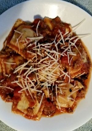 A picture of Tinklee's Easy Sausage Sauce and Frozen Ravioli.