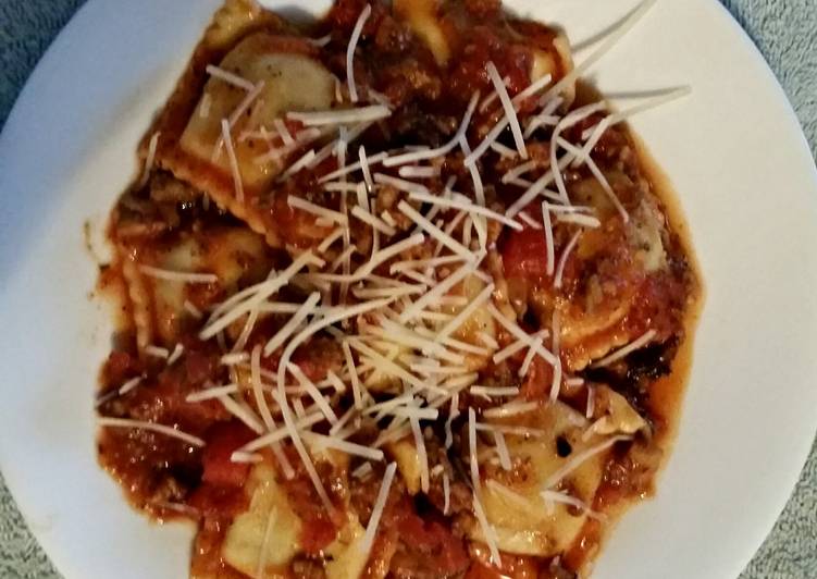 Steps to Prepare Quick Tinklee&#39;s Easy Sausage Sauce and Frozen Ravioli