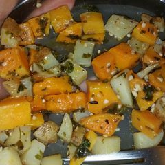A picture of Roasted potatoes and butternut squash.