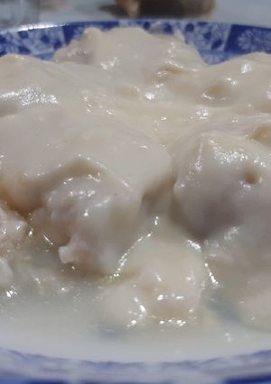 Una foto de Sorrentinos de Jamón y Queso con Salsa Blanca