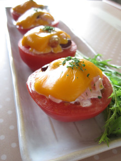 A picture of Baked Tomatoes with Beans & Cheese.