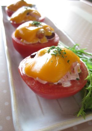 A picture of Baked Tomatoes with Beans & Cheese.
