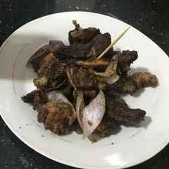 A picture of Fried goat meat.