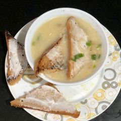 A picture of Green onion soup with Mayo toast.