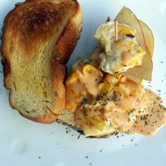 A picture of Turkey Ham And Pineapple Scrumble Egg Sandwich.