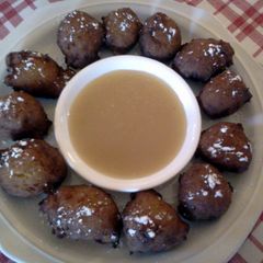 A picture of Sweet Potato Fritters w/ Butter Dipping Sauce.