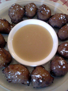 A picture of Sweet Potato Fritters w/ Butter Dipping Sauce.