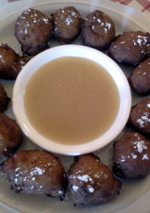 A picture of Sweet Potato Fritters w/ Butter Dipping Sauce.
