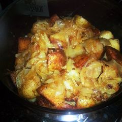 A picture of Potatoes with Caramelized Onions.