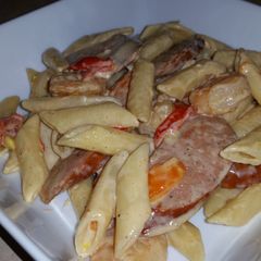 A picture of Cajun shrimp Mostaccioli pasta w/ andouille sausage.