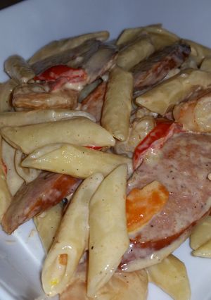 A picture of Cajun shrimp Mostaccioli pasta w/ andouille sausage.