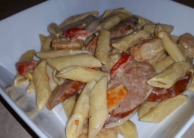 Delicious Cajun shrimp Mostaccioli pasta w/ andouille sausage