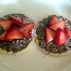 A picture of Nutella Waffle With Strawberries.
