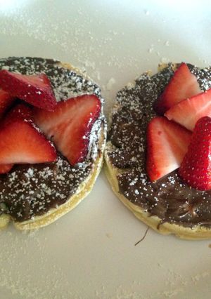 A picture of Nutella Waffle With Strawberries.