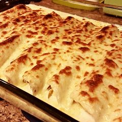 A picture of Cheesy Chicken Enchiladas.