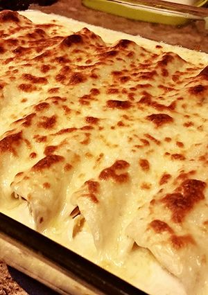 A picture of Cheesy Chicken Enchiladas.