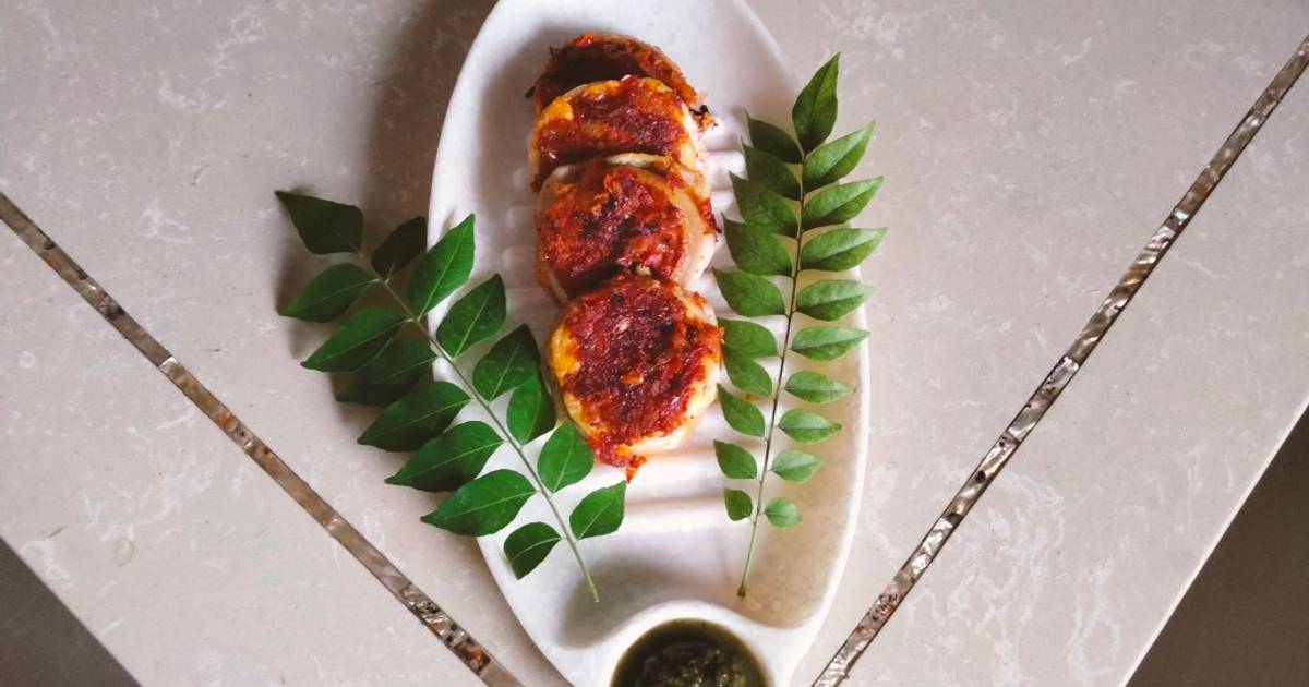 Onion rings stuffed with spicy masala and dosa batter Recipe by Kalpana